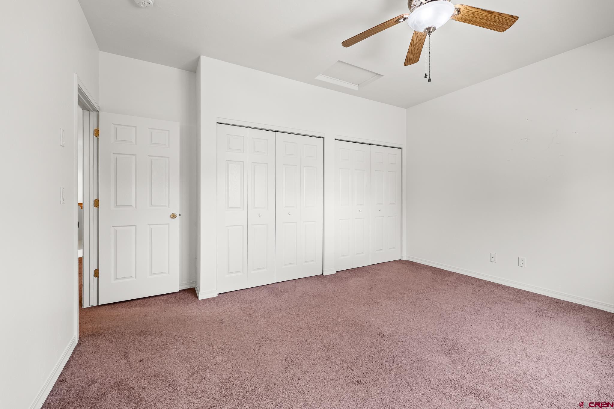33 Cedar Ridge Way, Unit 3 Durango, CO 81301 - Photo 22 of 31 an empty room with fan