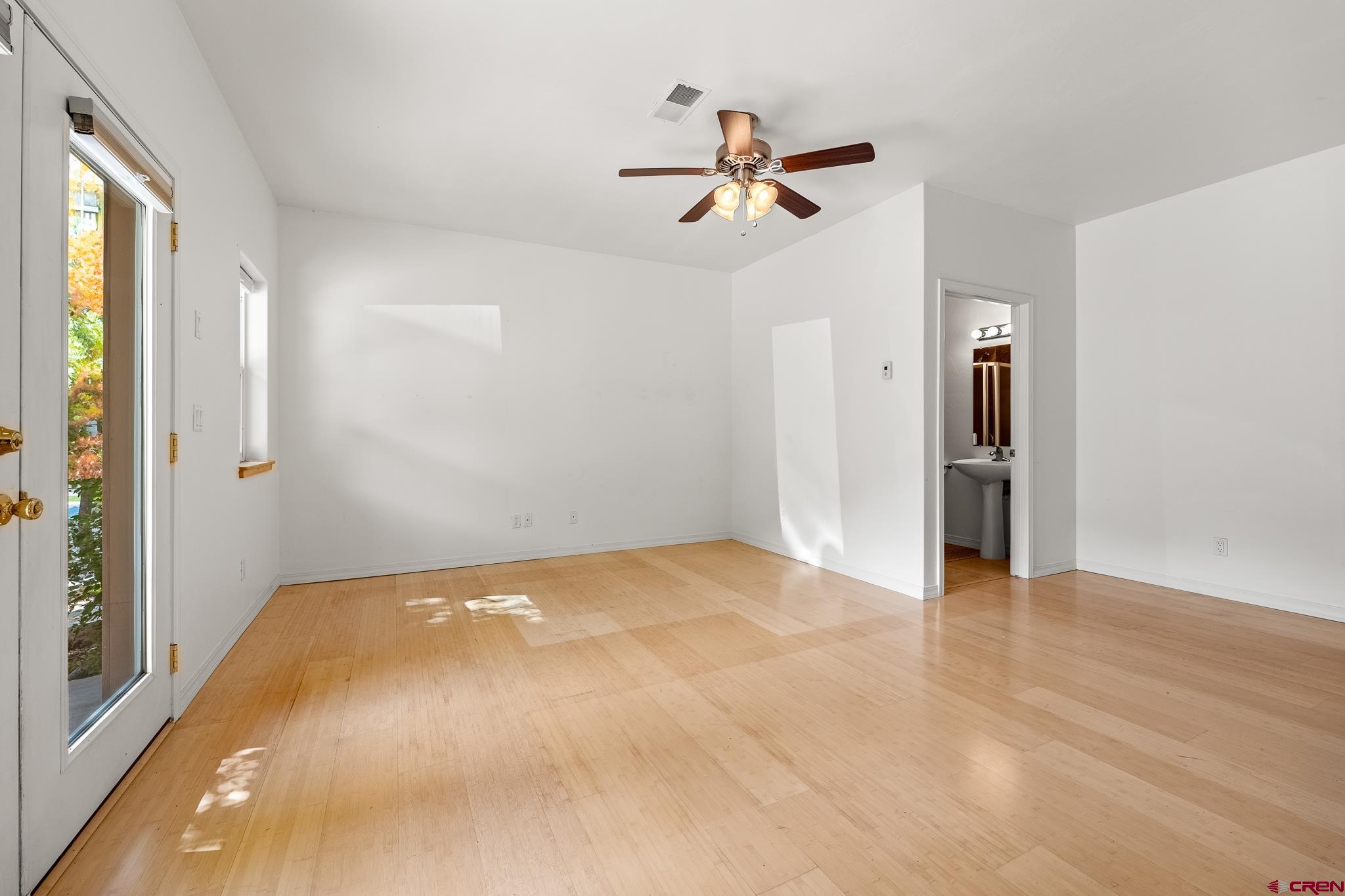 33 Cedar Ridge Way, Unit 3 Durango, CO 81301 - Photo 26 of 31 a view of empty room with wooden floor and fan