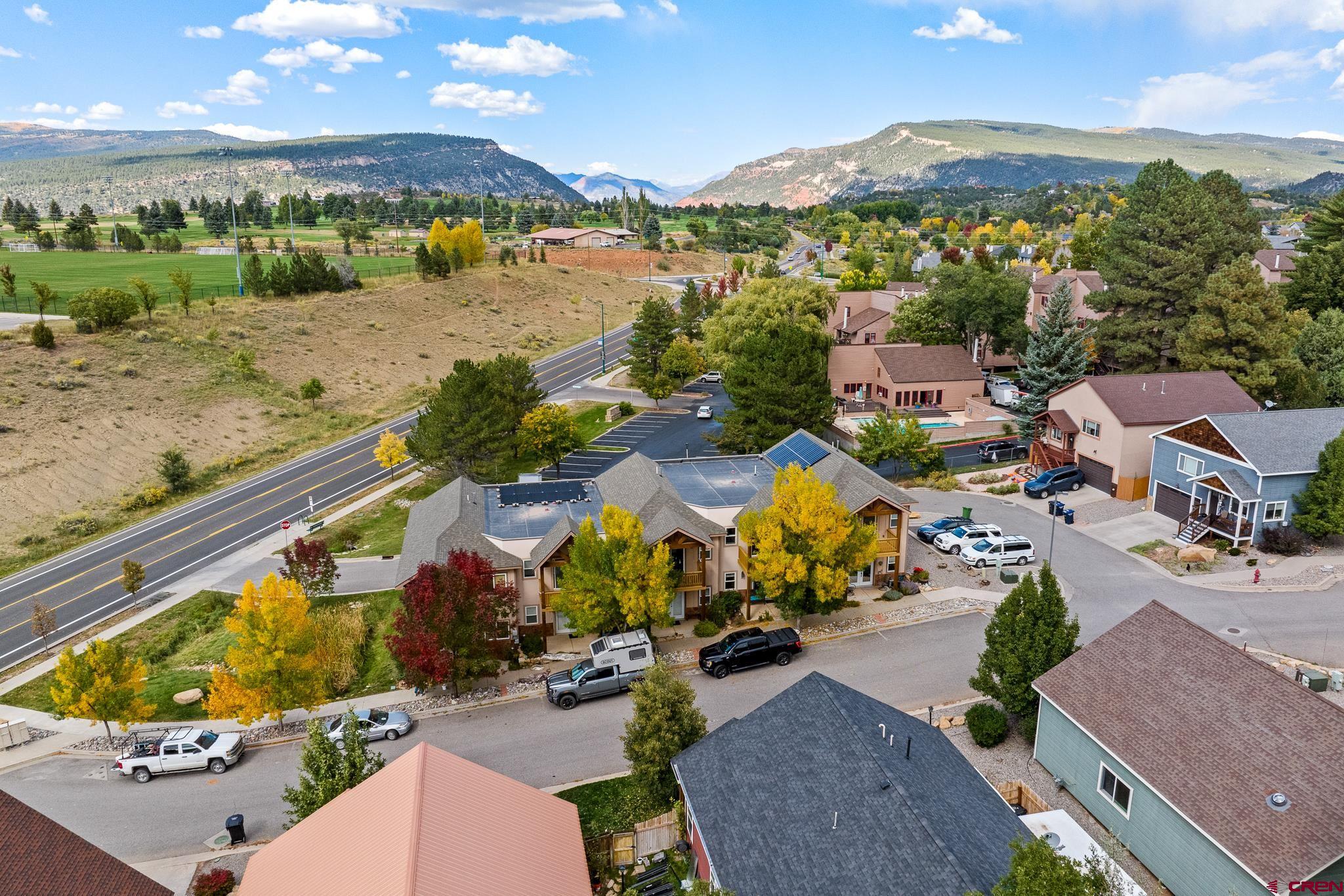 33 Cedar Ridge Way, Unit 3 Durango, CO 81301 - Photo 4 of 31 an aerial view of residential houses with outdoor space