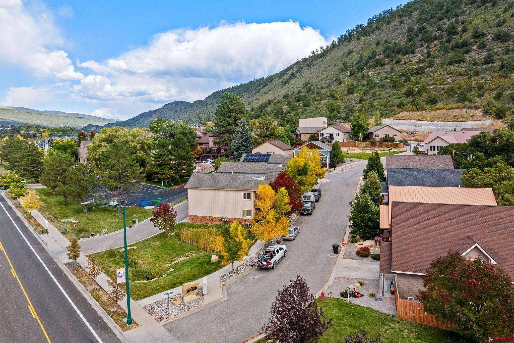33 Cedar Ridge Way, Unit 3 Durango, CO 81301 - Photo 6 of 31 an aerial view of a house with garden space and street view