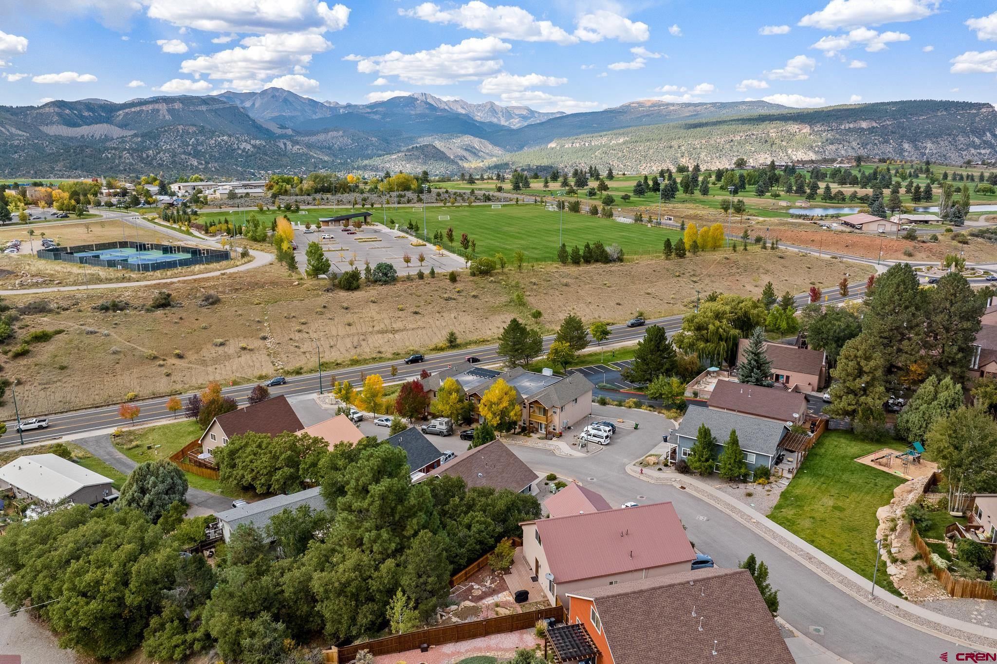 33 Cedar Ridge Way, Unit 3 Durango, CO 81301 - Photo 8 of 31 an aerial view of residential houses with outdoor space