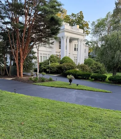 a house view with a garden space