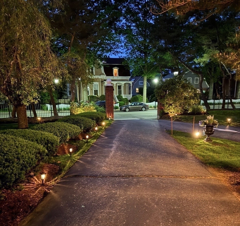 600 Washington Street, Unit 7 Wellesley, MA 02482 - Photo 11 of 13 a view of a street with houses on both side