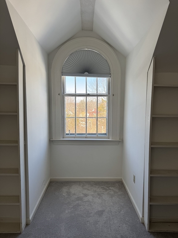 600 Washington Street, Unit 7 Wellesley, MA 02482 - Photo 9 of 13 an empty room with a window