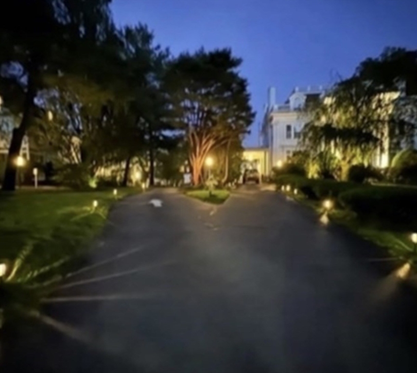 600 Washington Street, Unit 7 Wellesley, MA 02482 - Photo 10 of 13 a view of a street both of side of the house