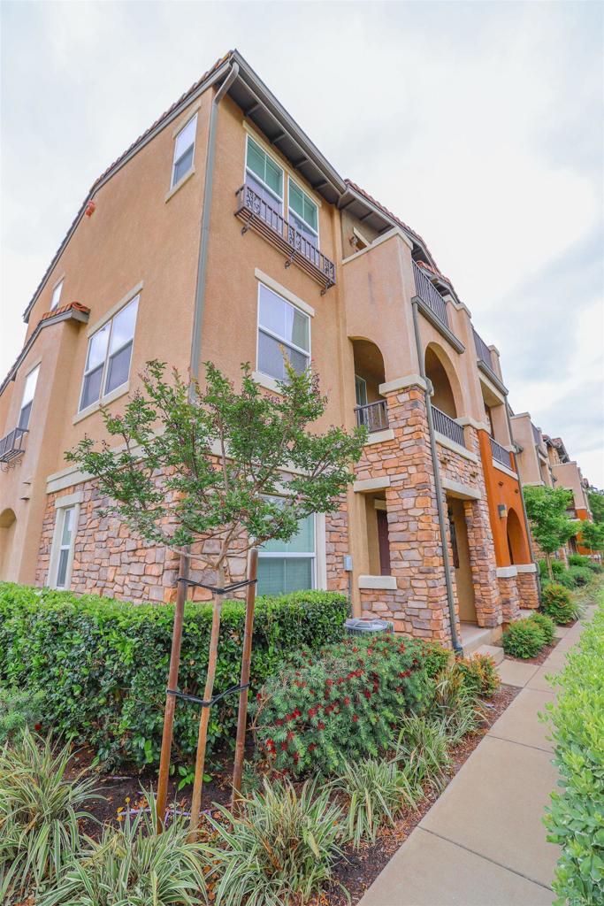 8808 Aspenglow Place, Unit 1 Santee, CA 92071 - Photo 1 of 1 a front view of a house with a yard