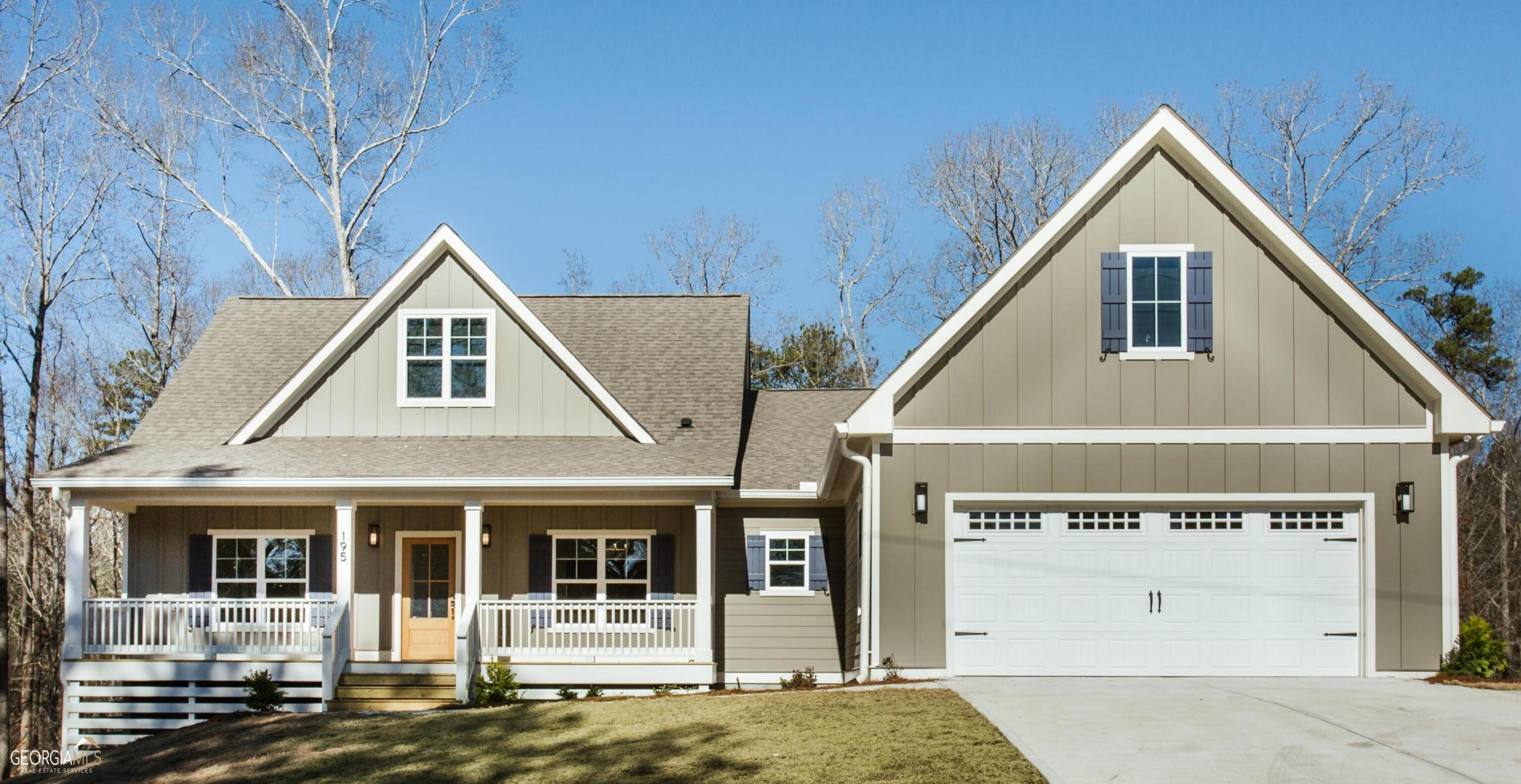 460 Old Airport Road Commerce, GA 30530 - Photo 1 of 1 a front view of a house with garage