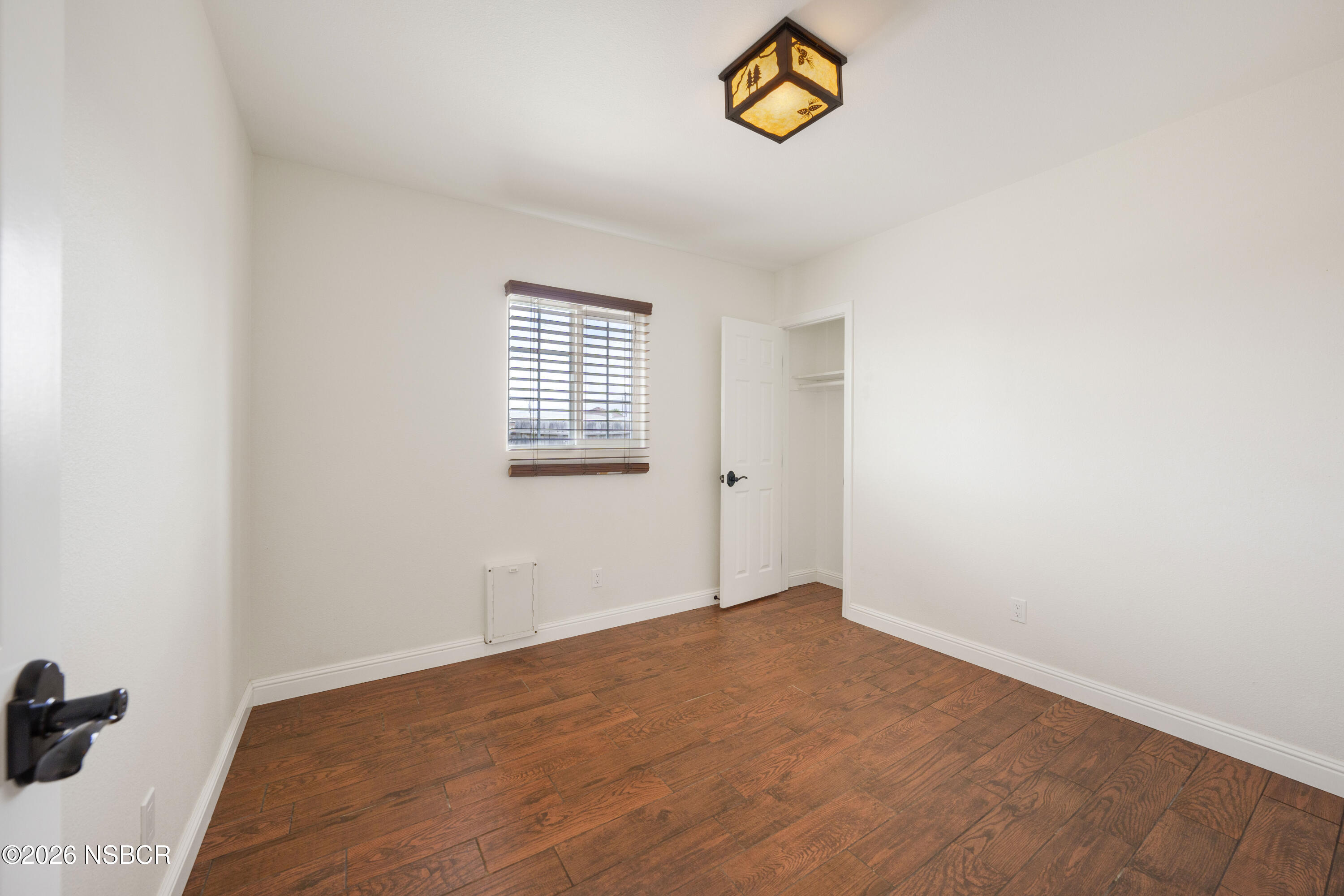 138 North E Street Lompoc, CA 93436 - Photo 21 of 35 an empty room with a window
