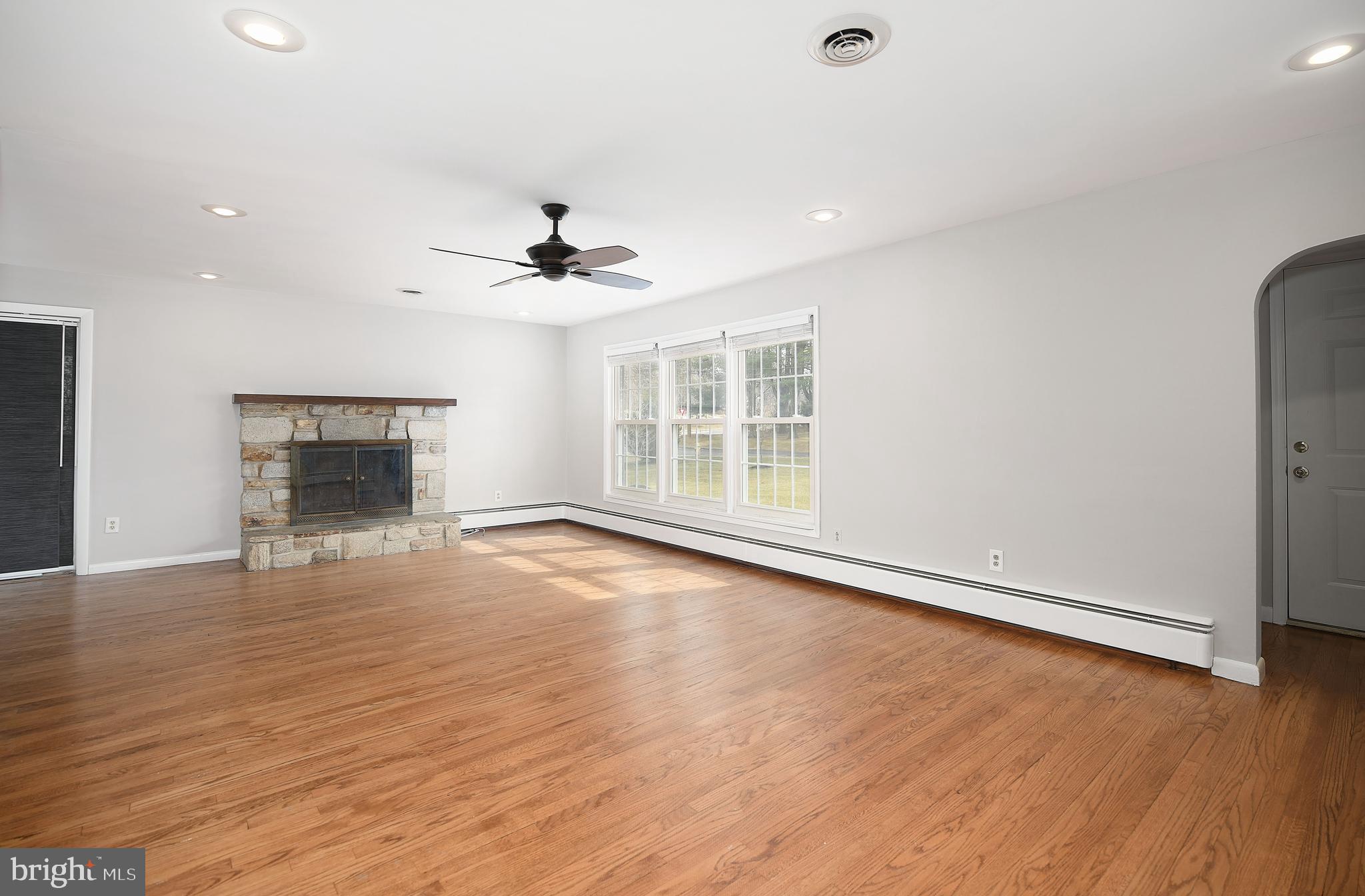 300 Plumtree Road Bel Air, MD 21015 - Photo 14 of 60 Wood burning FP w stone surround