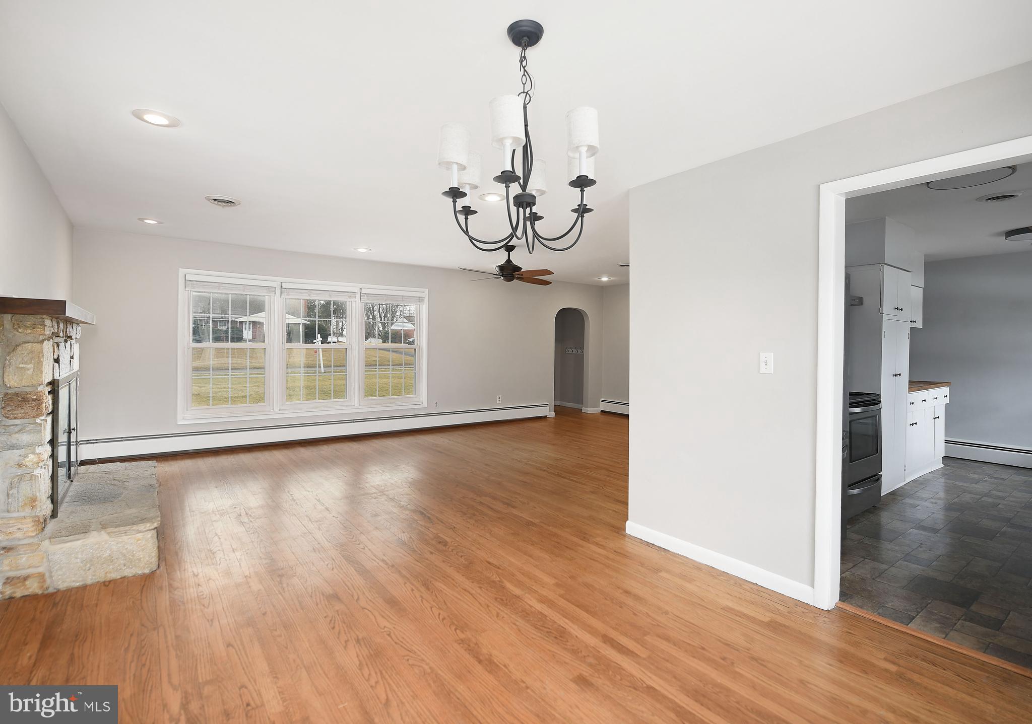 300 Plumtree Road Bel Air, MD 21015 - Photo 16 of 60 LR opens to DR with overhead chandelier