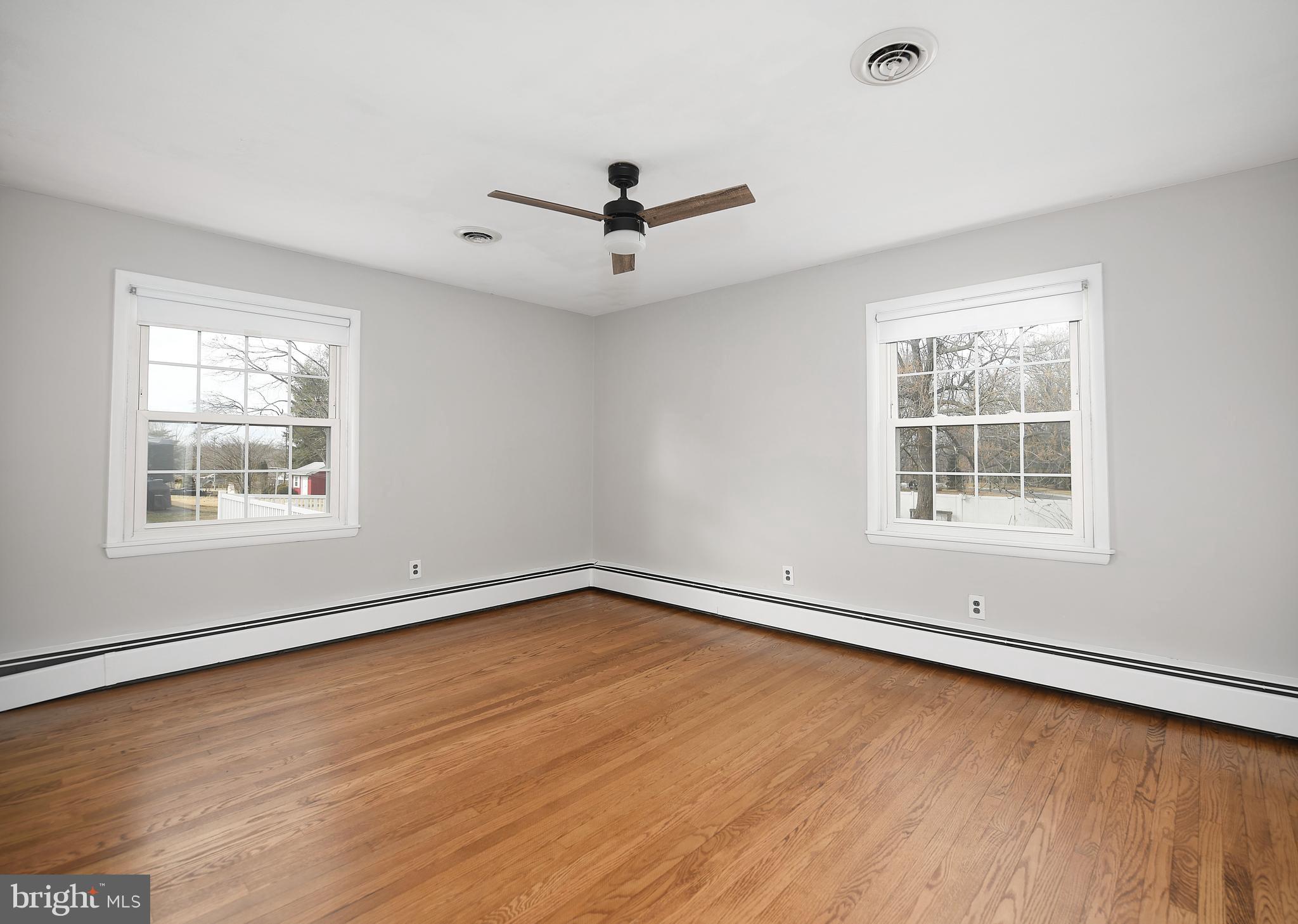 300 Plumtree Road Bel Air, MD 21015 - Photo 34 of 60 Bedroom 3 w ceiling fan and large windows