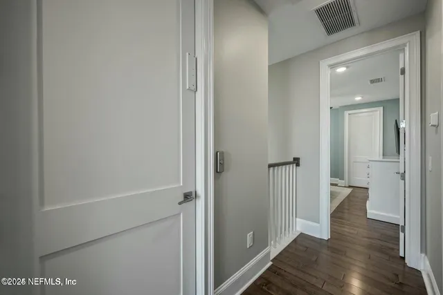 a view of a patio with a table and chairs