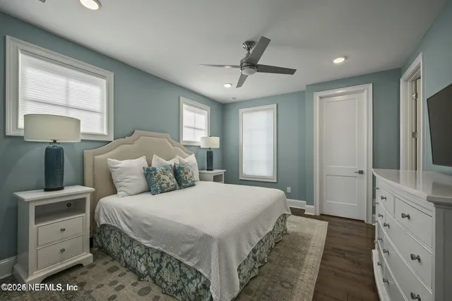 a view of a balcony with wooden floor and city view