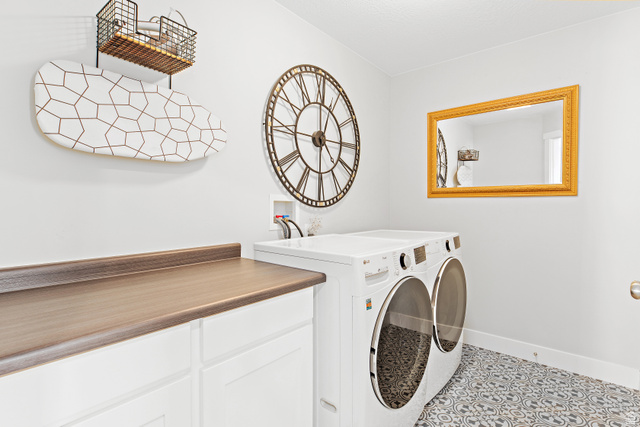 2343 Wysteria Drive Mapleton, UT 84664 - Photo 26 of 30 Laundry room with washing machine and clothes dryer and tile patterned floors