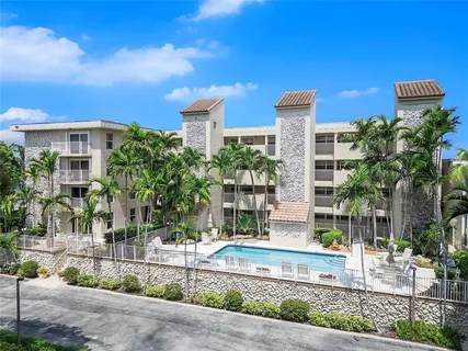 a view of a house with a swimming pool