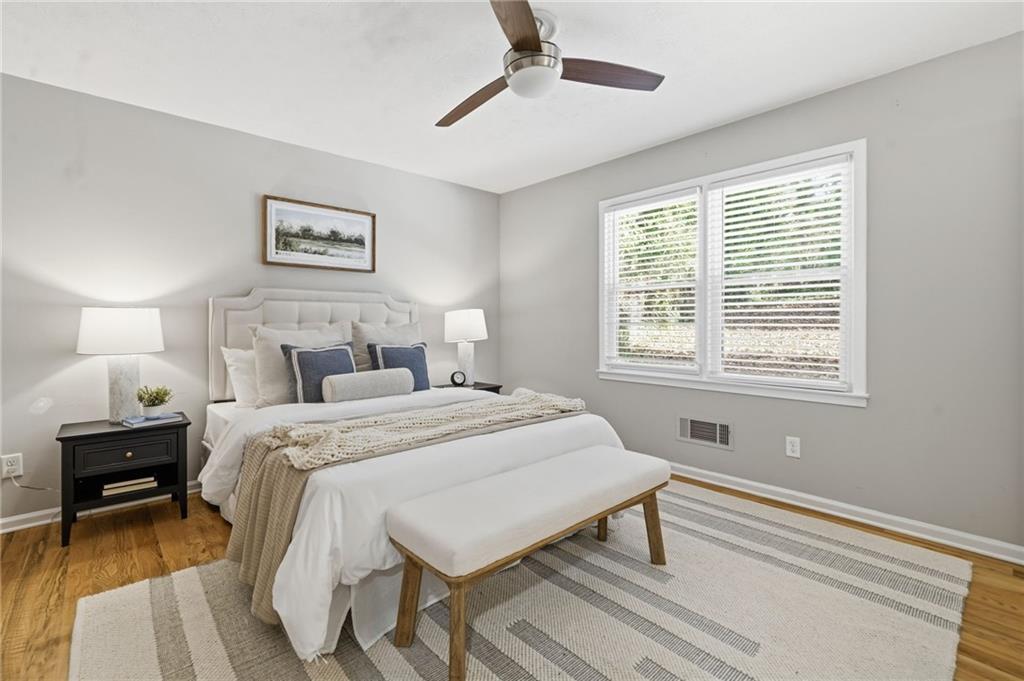 111 John Christopher Drive Alpharetta, GA 30009 - Photo 15 of 30 a bedroom with a bed and a window