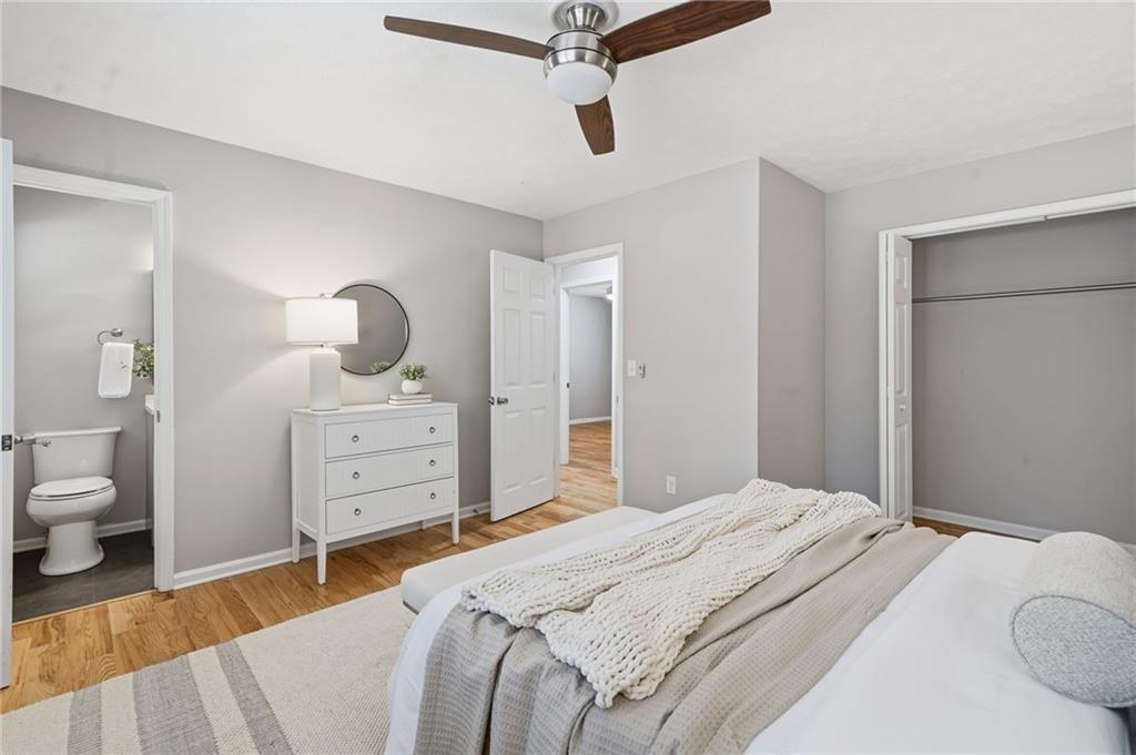 111 John Christopher Drive Alpharetta, GA 30009 - Photo 16 of 30 a bedroom with a bed and a dresser