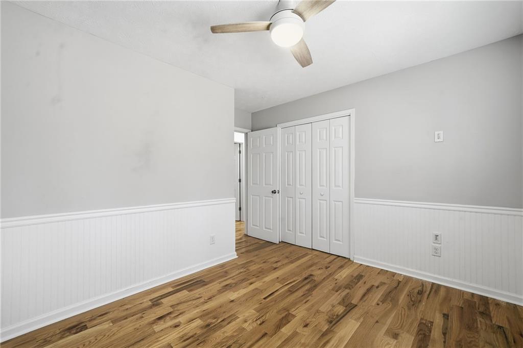 111 John Christopher Drive Alpharetta, GA 30009 - Photo 20 of 30 a view of empty room with wooden floor