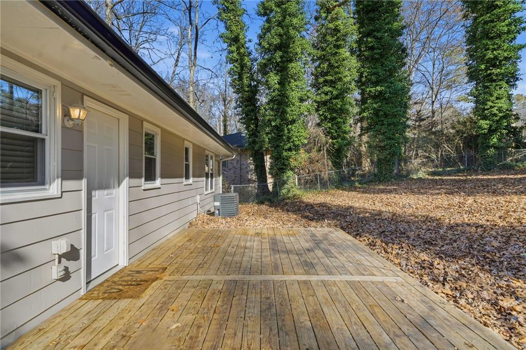111 John Christopher Drive Alpharetta, GA 30009 - Photo 28 of 30 a view of a balcony with wooden floor and fence
