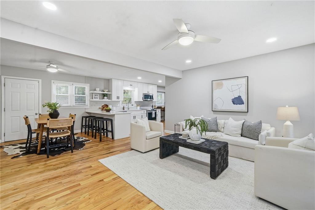 111 John Christopher Drive Alpharetta, GA 30009 - Photo 4 of 30 a living room with furniture and kitchen view