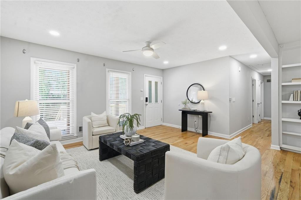 111 John Christopher Drive Alpharetta, GA 30009 - Photo 5 of 30 a living room with furniture and a large window
