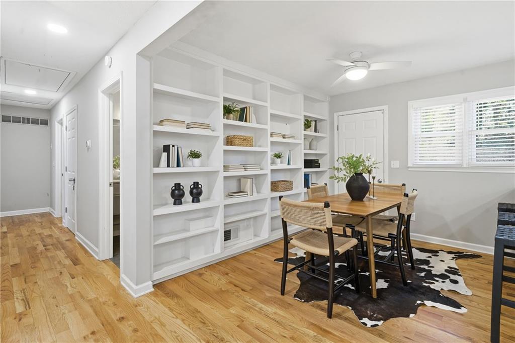 111 John Christopher Drive Alpharetta, GA 30009 - Photo 8 of 30 a view of a dining room with furniture and wooden floor