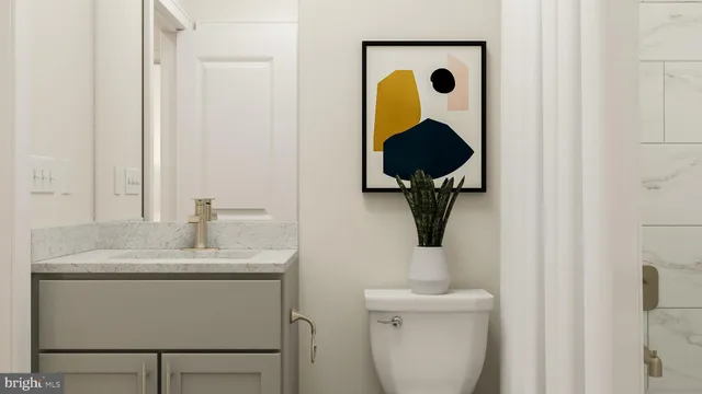 a bathroom with a sink and mirror