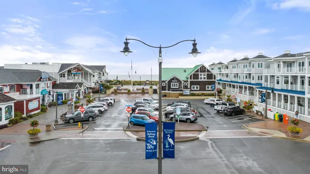 a view of a street with cars