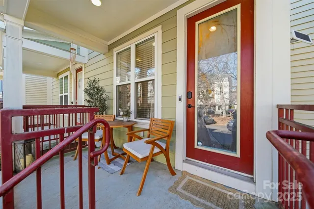 a view of an entryway wooden floor and a window