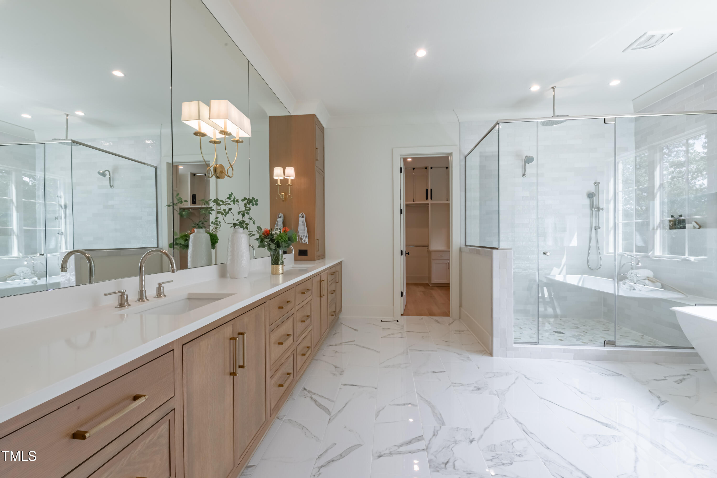 2227 Wheeler Road Raleigh, NC 27607 - Photo 34 of 56 a bathroom with a double vanity sink mirror and shower