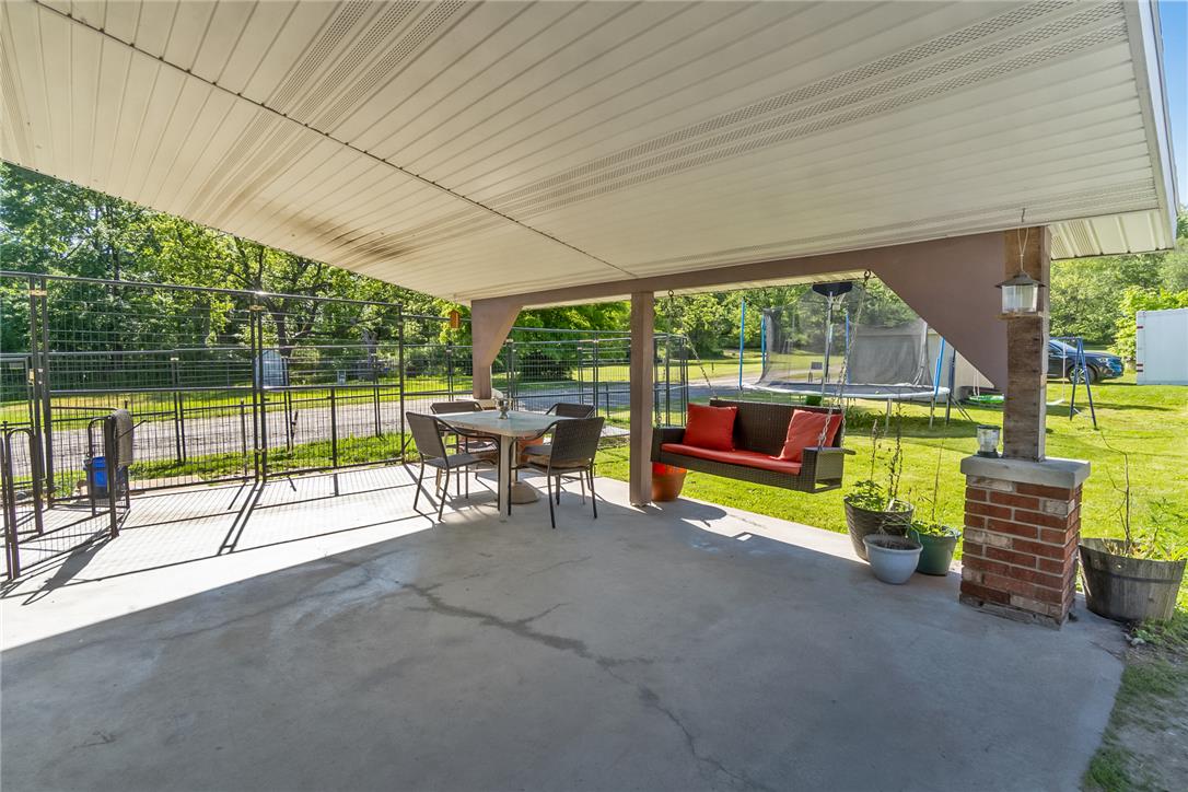331 East Lizard Creek Road Lehighton, PA 18235 - Photo 8 of 37 A spacious covered patio provides a delightful outdoor living area overlooking a verdant yard.