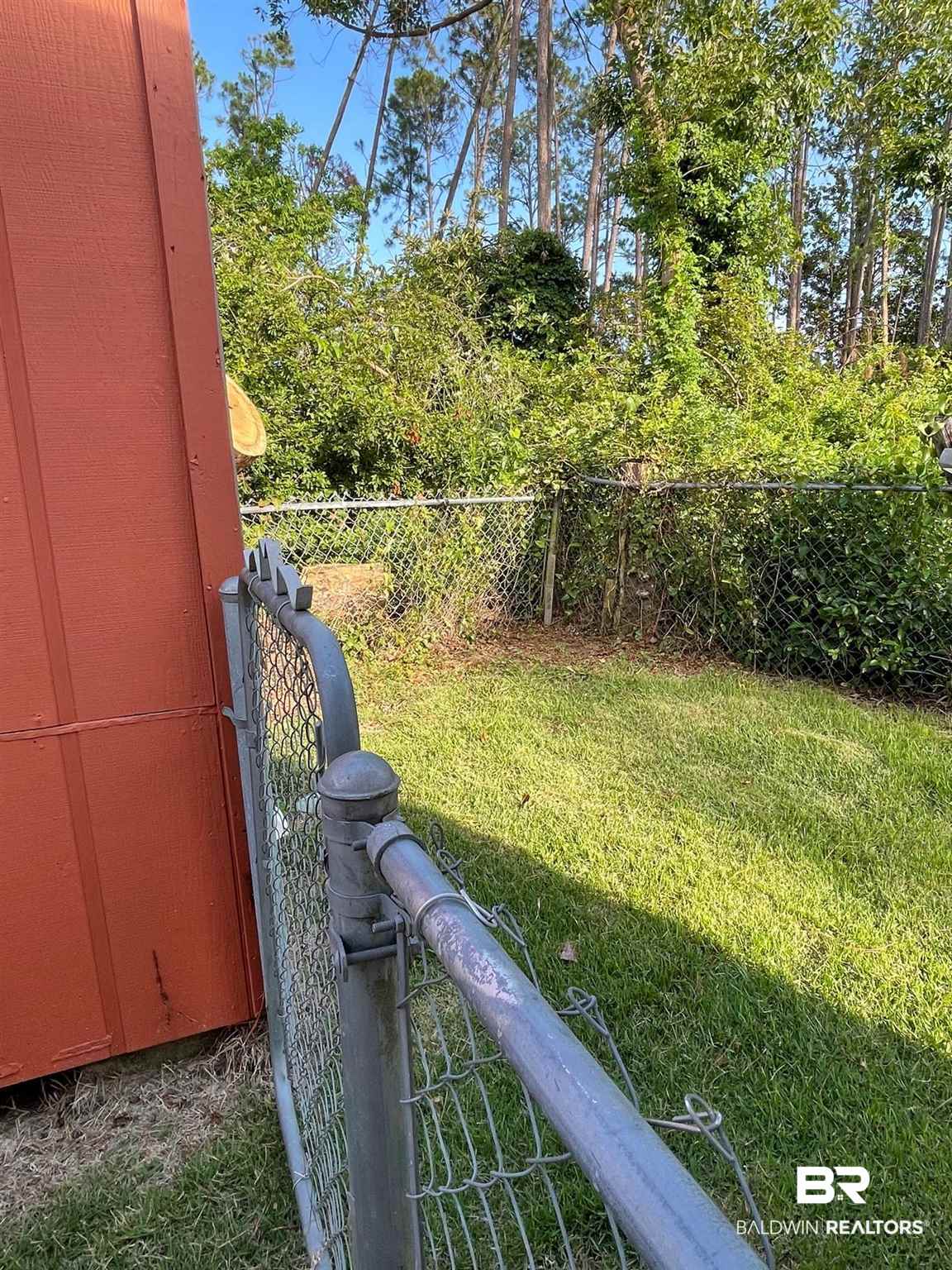 513 Elberta Loop Lillian, AL 36549 - Photo 18 of 30 Fenced Dog Run