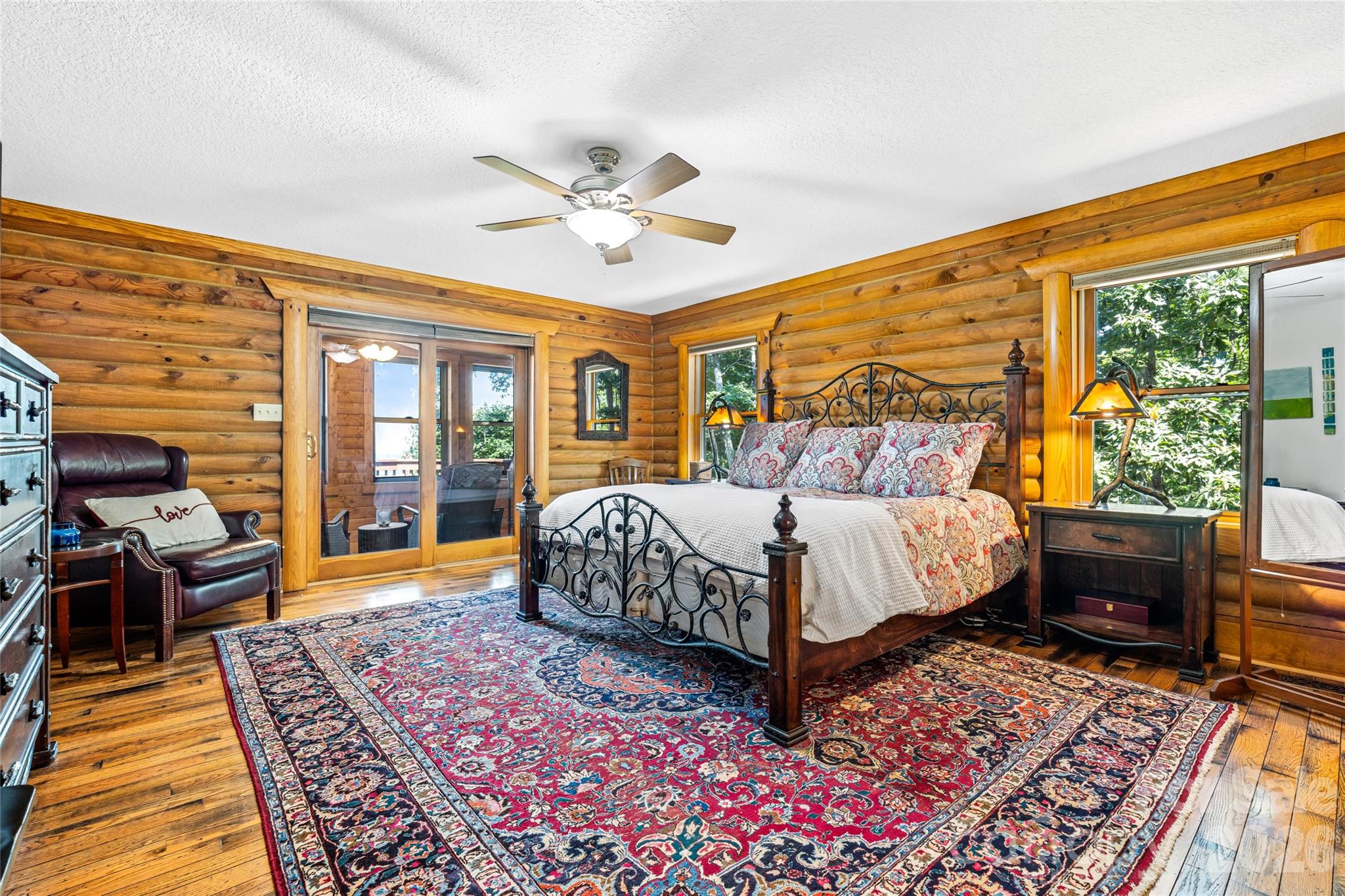 82 Running Ridge Road Asheville, NC 28804 - Photo 15 of 45 a bed sitting in a spacious bedroom next to a window