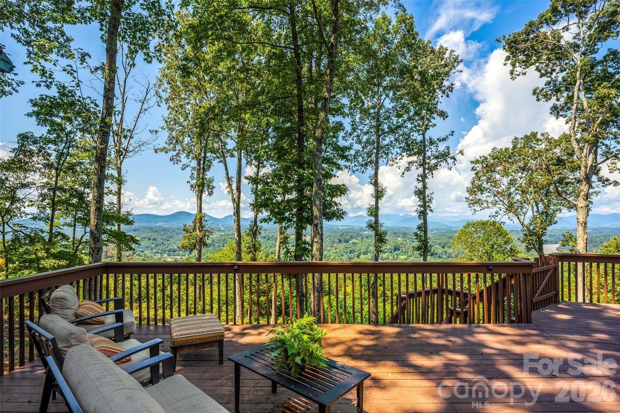 82 Running Ridge Road Asheville, NC 28804 - Photo 16 of 45 a view of a wooden roof deck