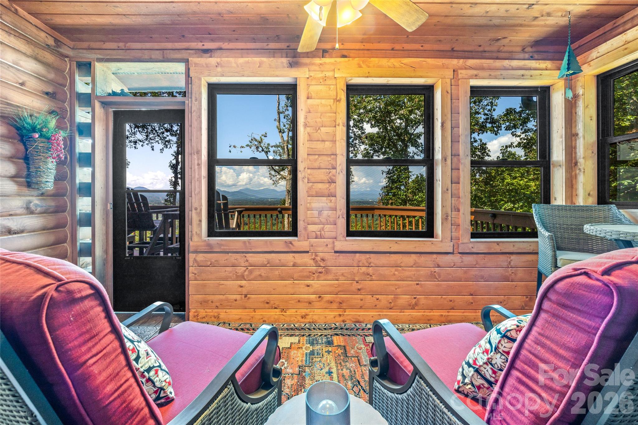 82 Running Ridge Road Asheville, NC 28804 - Photo 17 of 45 a backyard of a house with seating space