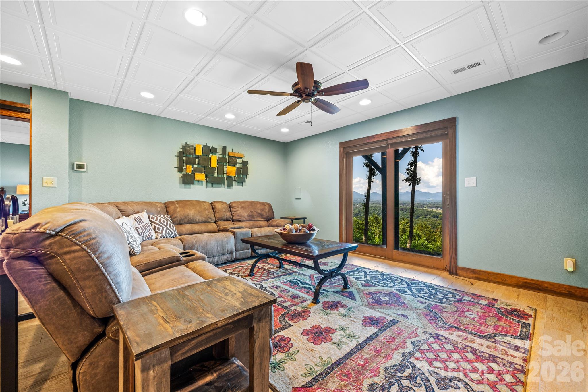82 Running Ridge Road Asheville, NC 28804 - Photo 22 of 45 a living room with furniture two window and a rug