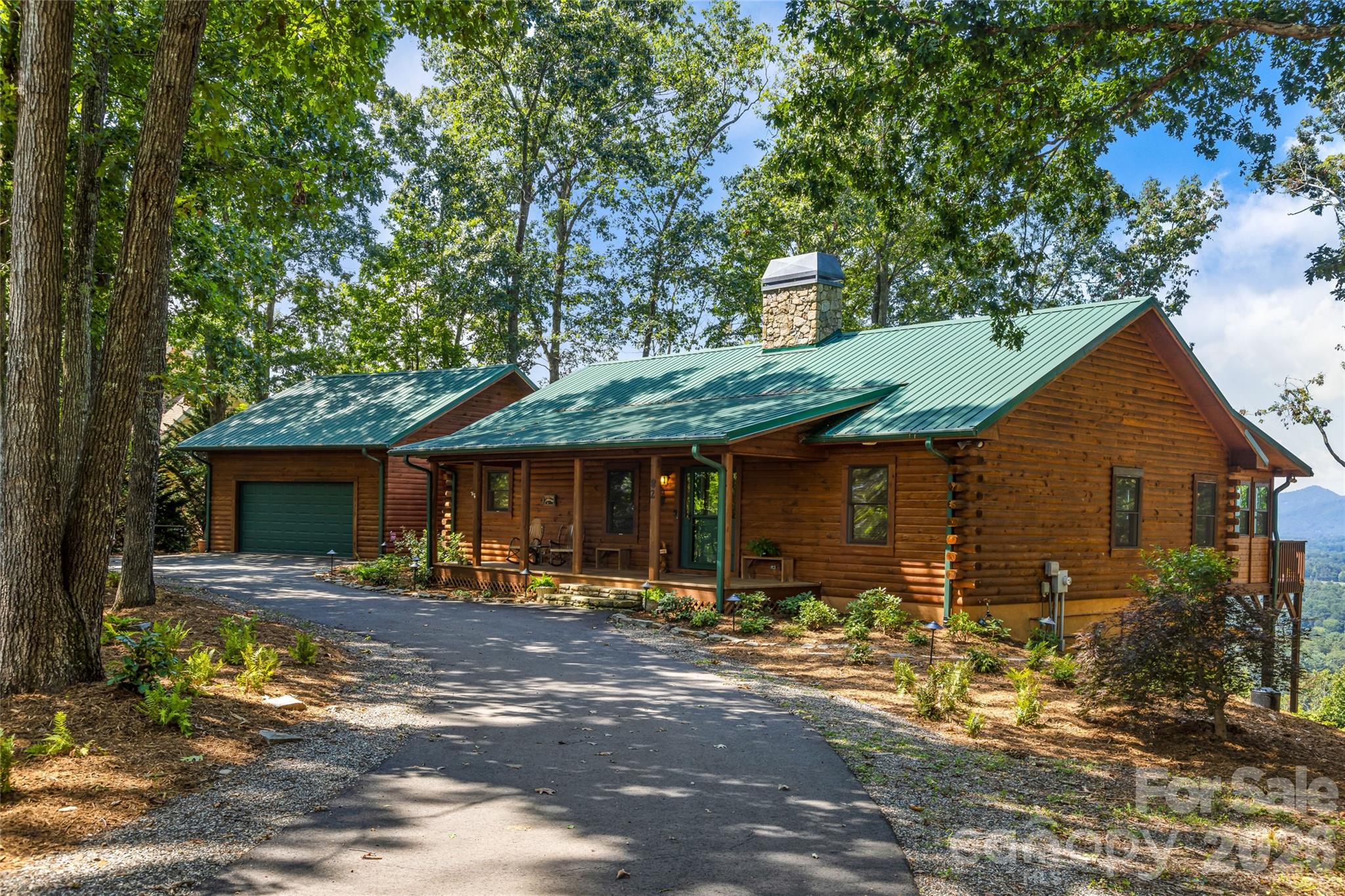 82 Running Ridge Road Asheville, NC 28804 - Photo 36 of 45 a front view of a house with garden