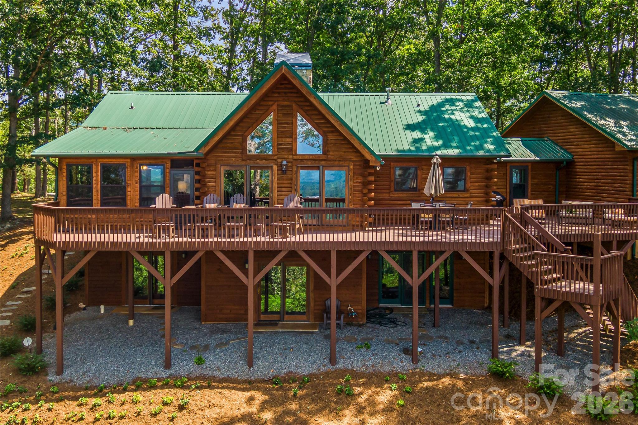82 Running Ridge Road Asheville, NC 28804 - Photo 37 of 45 an aerial view of a house with a porch