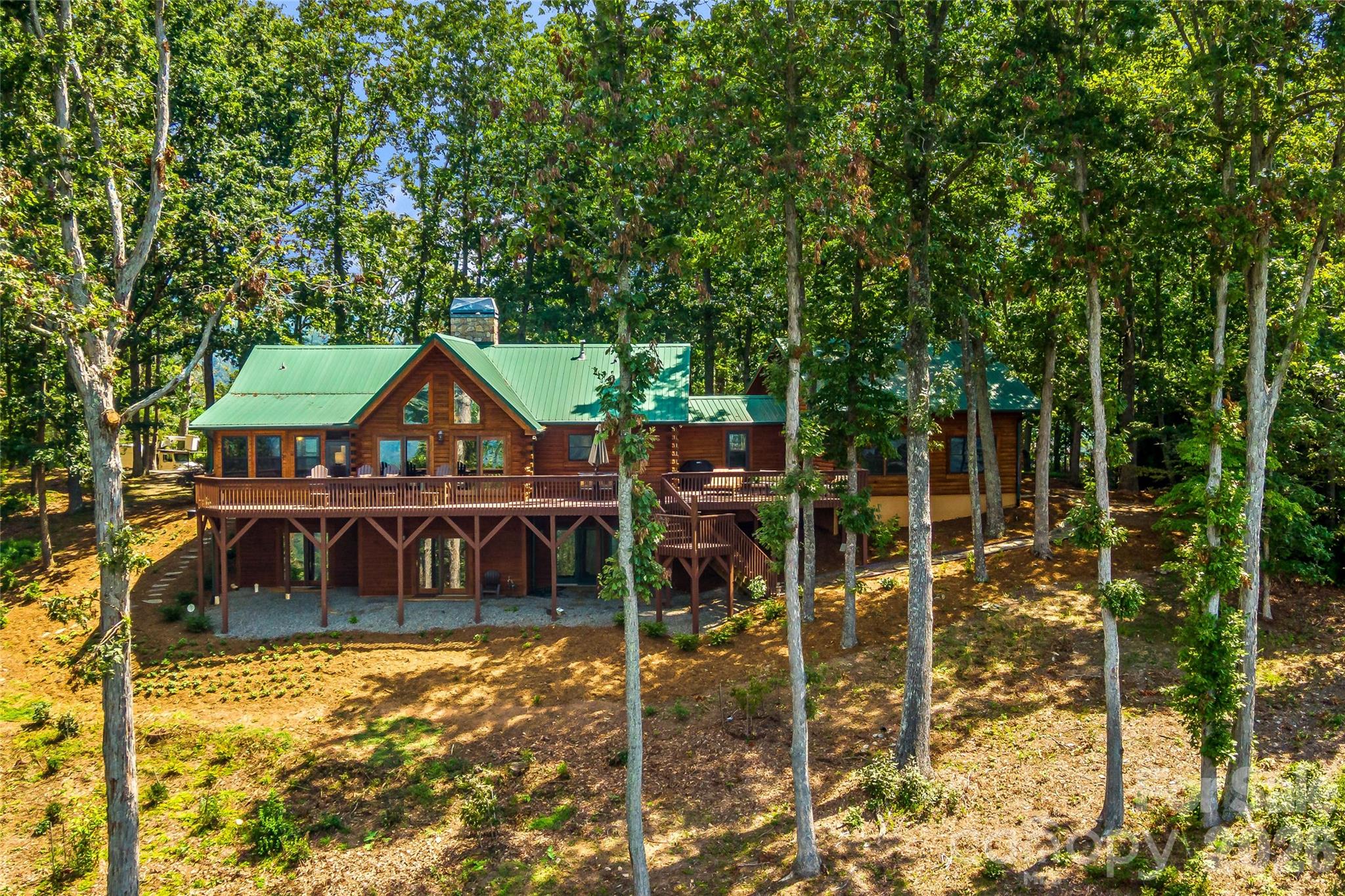 82 Running Ridge Road Asheville, NC 28804 - Photo 40 of 45 a front view of a house with garden