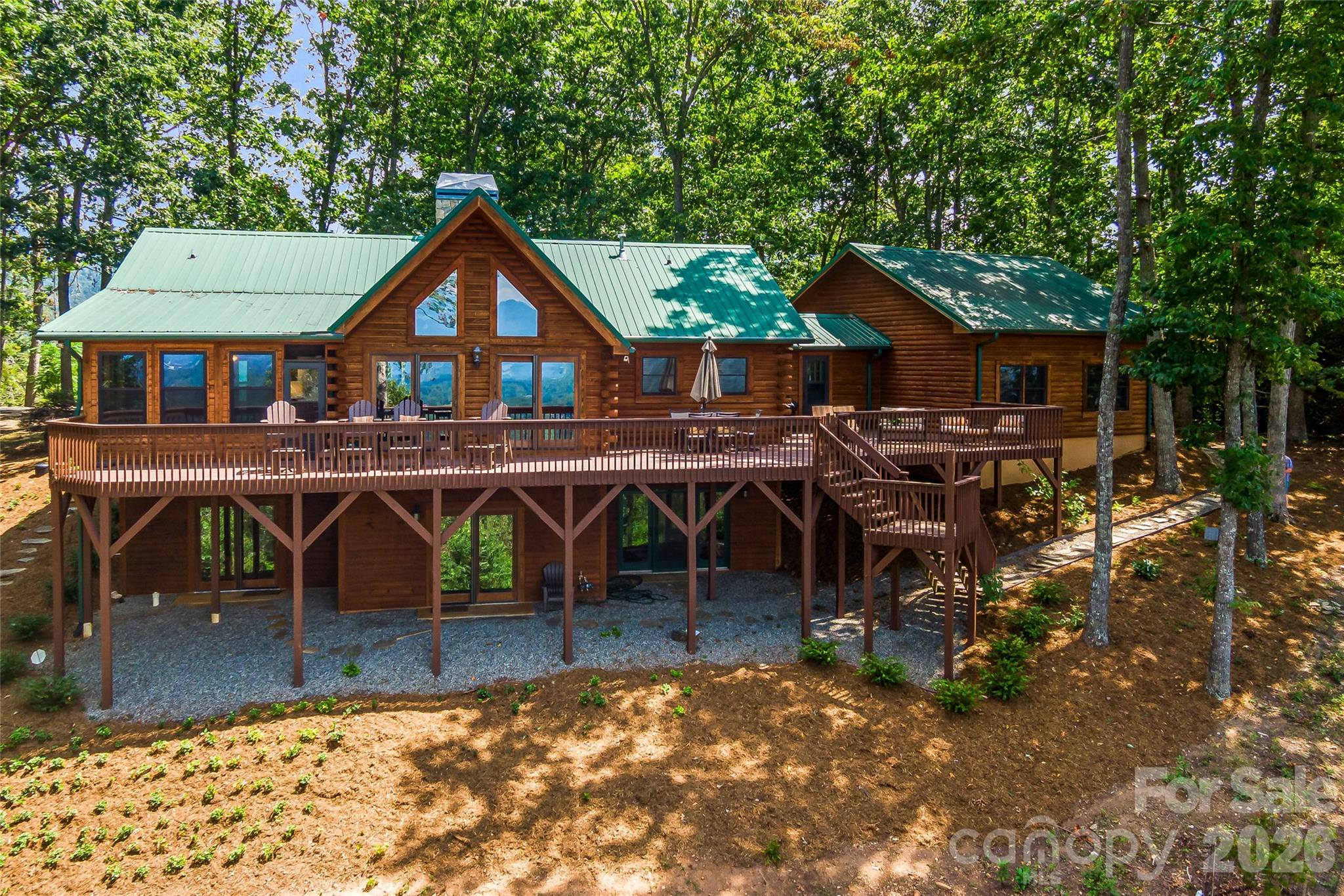 82 Running Ridge Road Asheville, NC 28804 - Photo 5 of 45 a view of a house with wooden deck