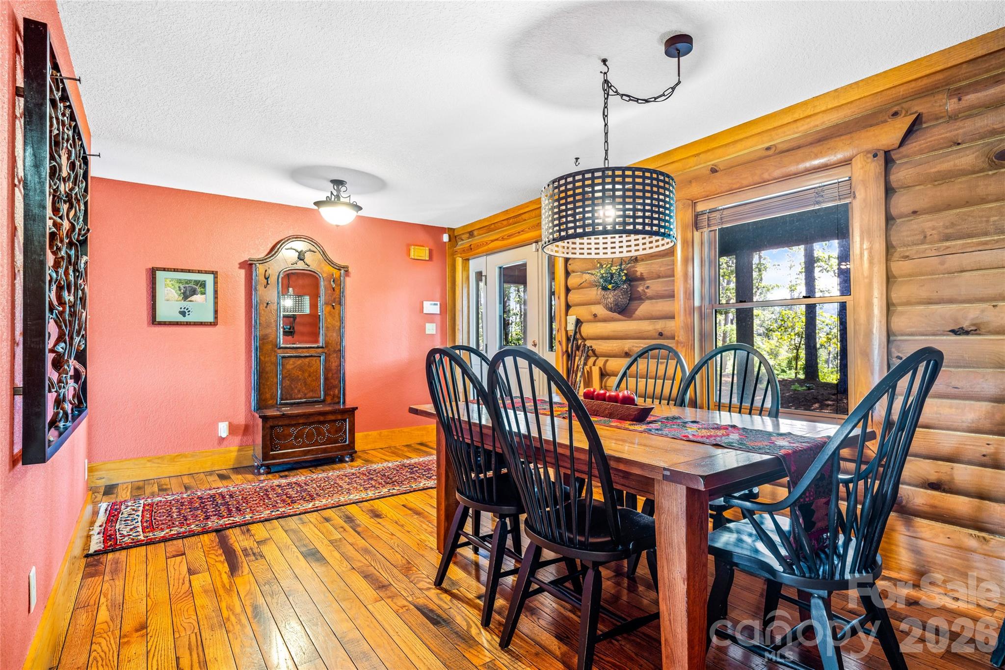 82 Running Ridge Road Asheville, NC 28804 - Photo 7 of 45 a dining room with furniture wooden floor a chandelier