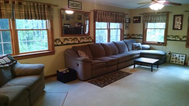 552 Durgintown Road Hiram, ME 04041 - Photo 4 of 24 The living room spans the entire...