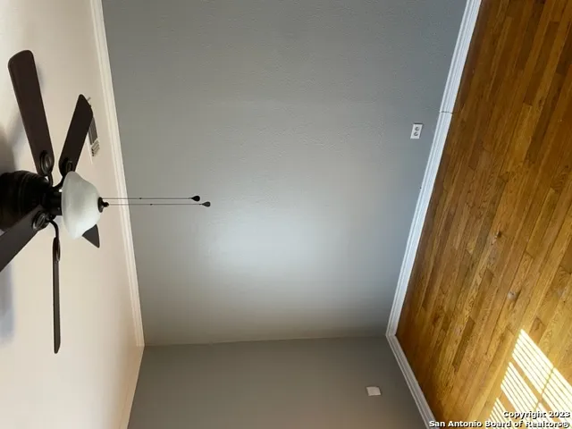 a bathroom with a sink toilet and mirror