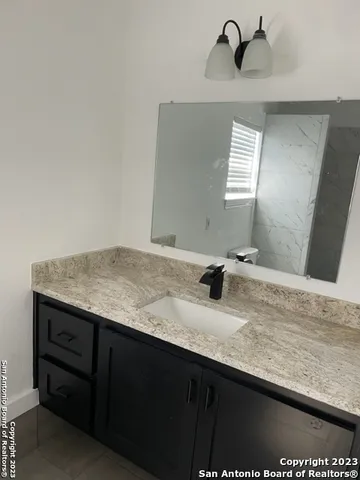 a view of small space with racks on the wall