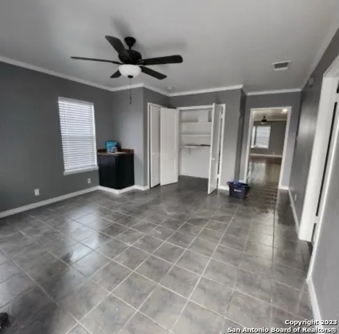 a view of entryway with a wooden fence
