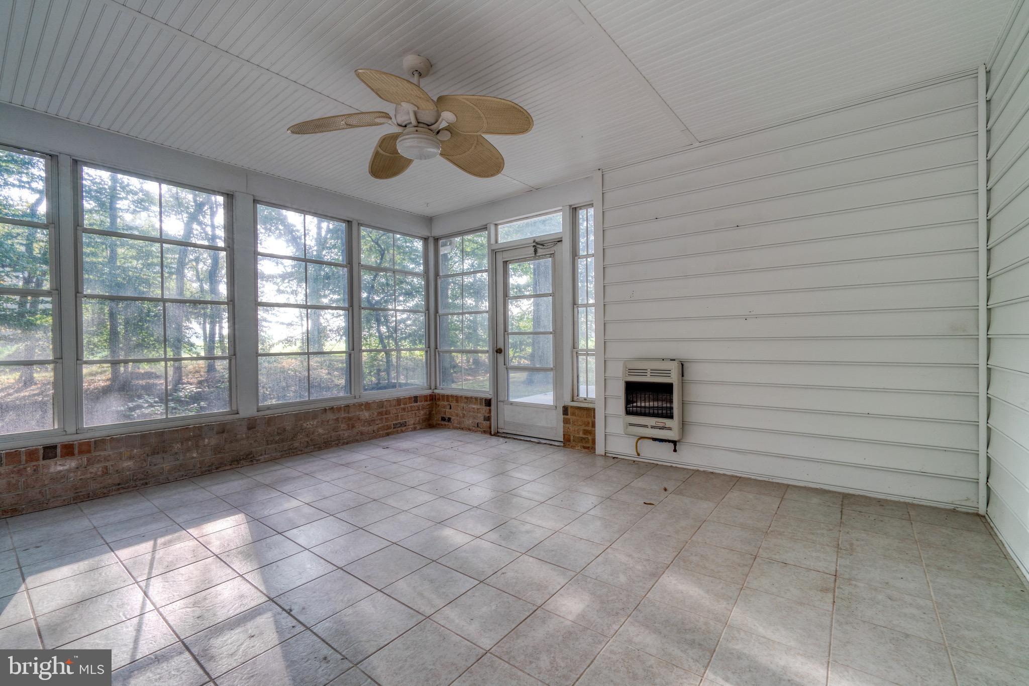 9540 Fairlee Road Chestertown, MD 21620 - Photo 21 of 31 Screened in porch with heater
