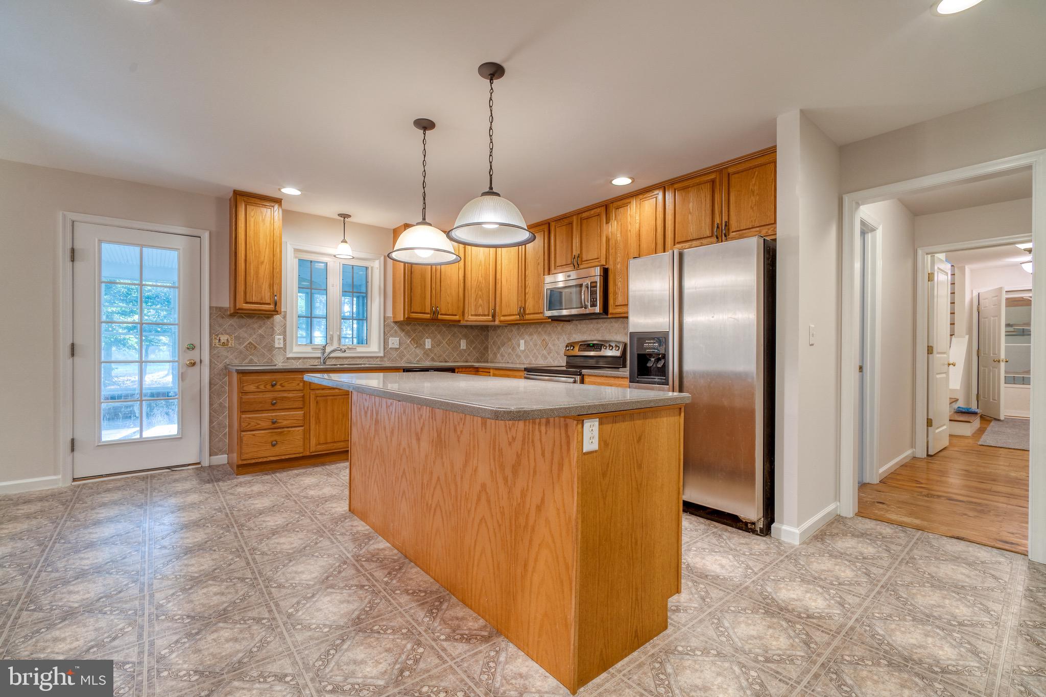 9540 Fairlee Road Chestertown, MD 21620 - Photo 6 of 31 Kitchen with access to screened in porch