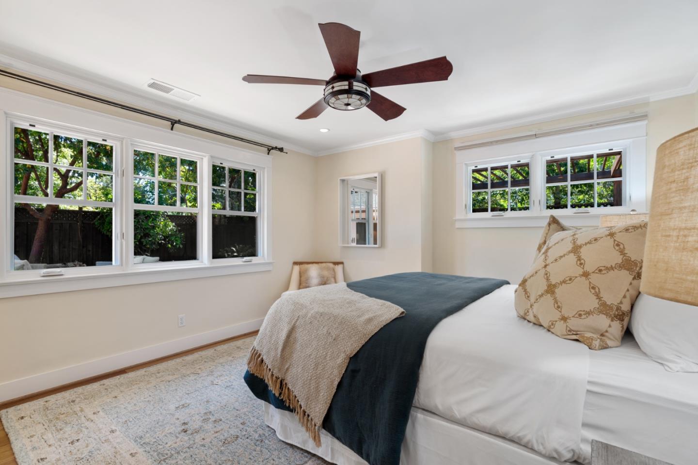 1563 Walnut Drive Palo Alto, CA 94303 - Photo 17 of 41 a bed sitting in a spacious bedroom next to a window