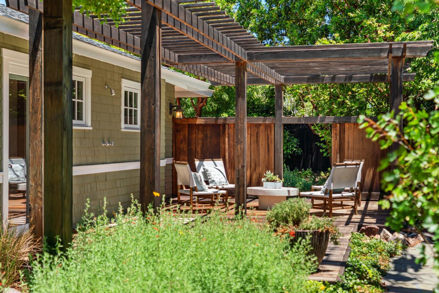 1563 Walnut Drive Palo Alto, CA 94303 - Photo 31 of 41 a view of backyard with a chair and potted plants