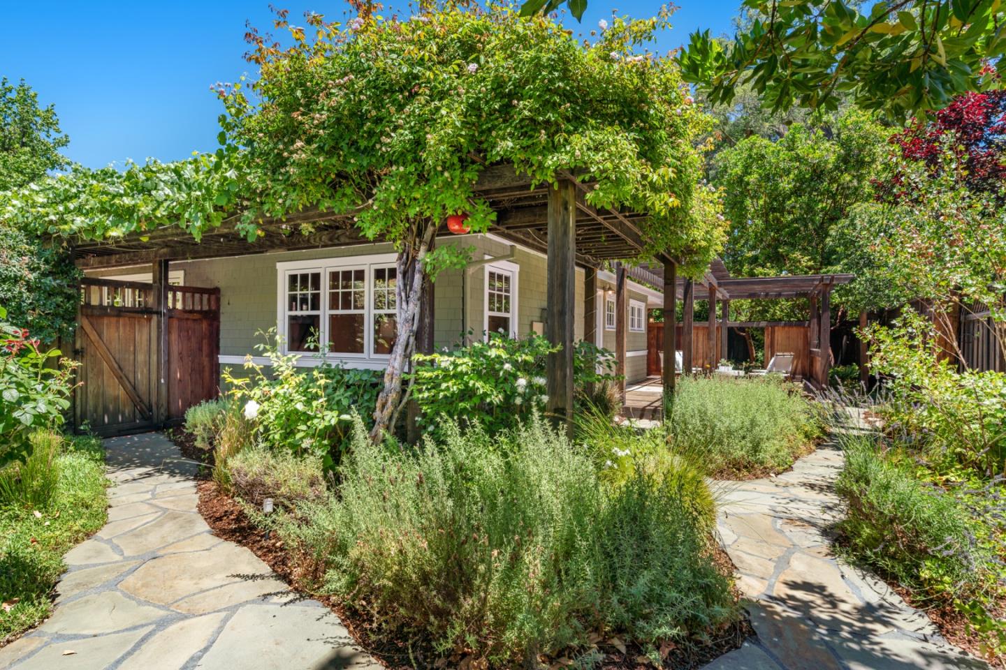 1563 Walnut Drive Palo Alto, CA 94303 - Photo 32 of 41 a front view of a house with garden